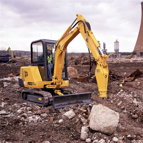 mini excavator breaking concrete|mini excavator with breaker attachment pictures.